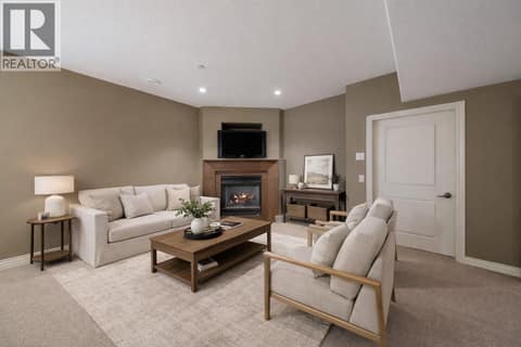 Basement Living area Ai staged at 2615 Harvard Road, South East Kelowna