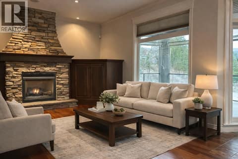 Family Room off kitchen Ai staged at 2615 Harvard Road, South East Kelowna