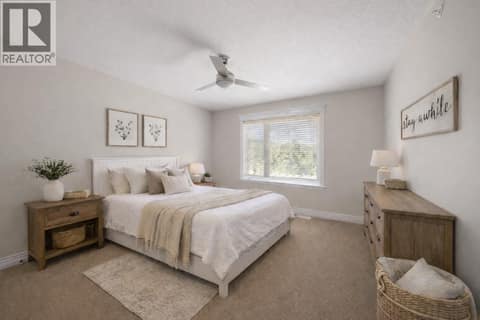 Upper Level Bedroom 2 Ai staged at 2615 Harvard Road, South East Kelowna