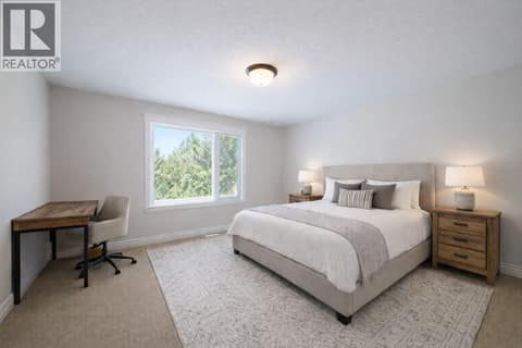 Upper level bedroom 3 Ai staged at 2615 Harvard Road, South East Kelowna