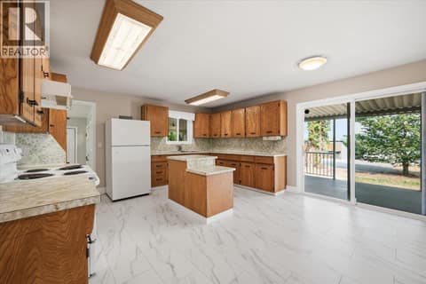Dining Area at Patio Doors at 3585 Warner Avenue, Armstrong/ Spall.
