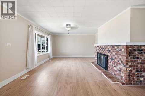 Living Room at 3585 Warner Avenue, Armstrong/ Spall.