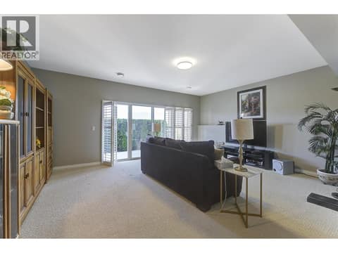 Lower Level Family room at 2455 Quail Ridge Boulevard Unit# 131, University District, Kelowna