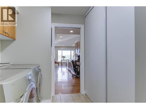 Mud room/Laundry to kitchen at 2455 Quail Ridge Boulevard Unit# 131, University District, Kelowna