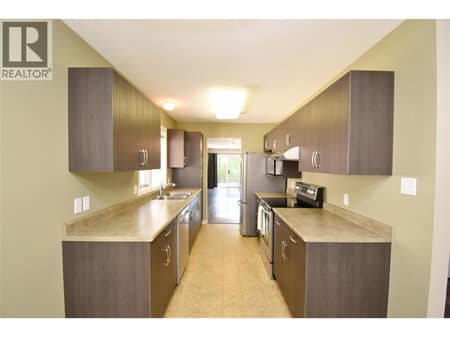 Kitchen at 3906 Pleasant Valley Road Unit# 19, Harwood, Vernon