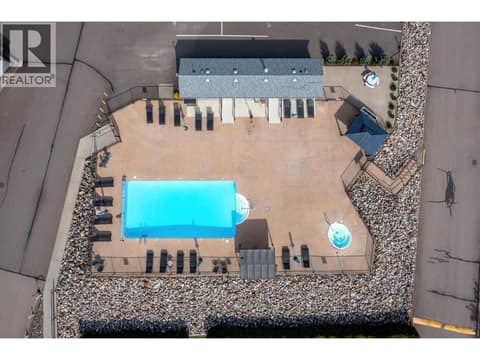Aerial view of the community pool and hot tub at 8000 Highland Road Unit# 33, North BX, Vernon