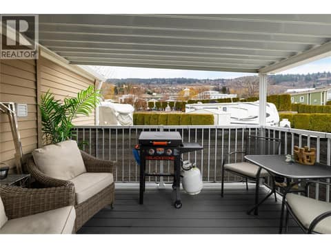 Covered private deck to enjoy the seasons at 8000 Highland Road Unit# 33, North BX, Vernon