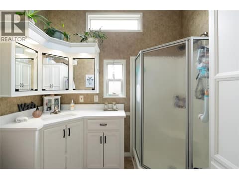 Functional bathroom with updates including quartz counter at 8000 Highland Road Unit# 33, North BX, Vernon
