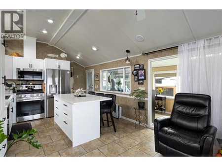 Kitchen with sit up island at 8000 Highland Road Unit# 33, North BX, Vernon