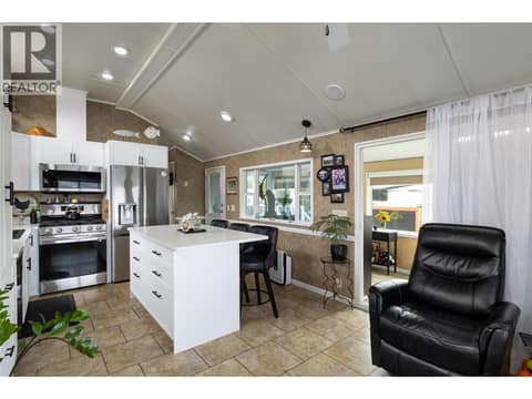 Kitchen with sit up island at 8000 Highland Road Unit# 33, North BX, Vernon