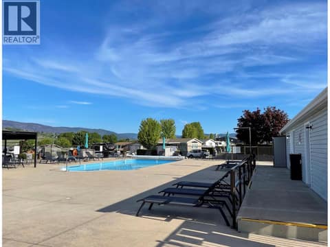 Relax by the pool in season at 8000 Highland Road Unit# 33, North BX, Vernon