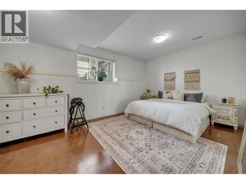 A comfortable bedroom with generous closet space. at 336 Quilchena Drive, Kettle Valley, Kelowna