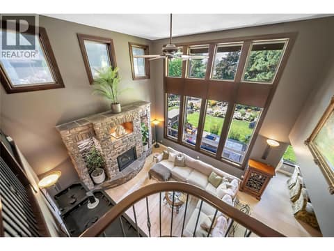 Loft overlooking main floor: A versatile loft space overlooks the main living area below at 336 Quilchena Drive, Kettle Valley, Kelowna