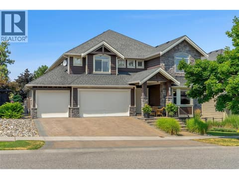 Striking curb appeal welcomes you to this Kettle Valley estate. Manicured landscaping and a grand entrance set the tone for what's inside at 336 Quilchena Drive, Kettle Valley, Kelowna
