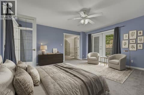 Virtually staged primary bedroom at 743 Mt. Thor Drive, Middleton Mountain Coldstream