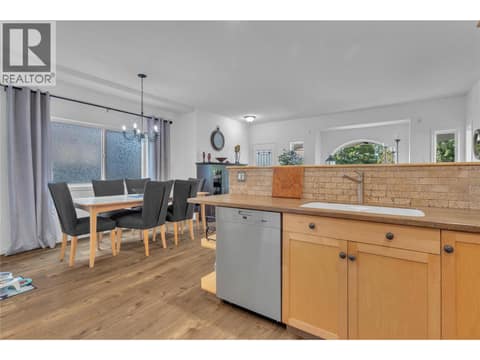 Dining room viewed from the kitchen. at 430 McCarren Avenue, Kettle Valley, Kelowna