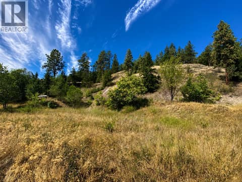 Backside view facing mountain. at 528 Snowsell Street N, North Glenmore, Kelowna