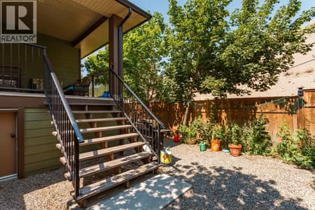 Back patio behind the kitchen at 2538 Copper Ridge Drive, Smith Creek, West Kelowna