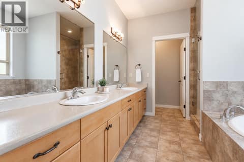 Primary bedroom en suite at 2538 Copper Ridge Drive, Smith Creek, West Kelowna