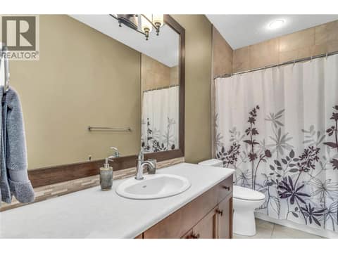 2nd Level Full Bathroom at 8780 Braeburn Drive, Middleton Mountain Coldstream