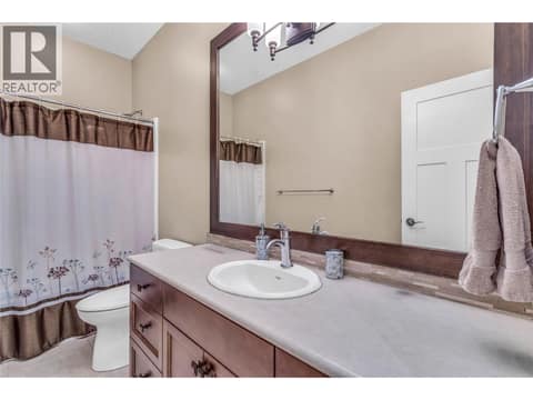 Bathroom on Entry Level at 8780 Braeburn Drive, Middleton Mountain Coldstream