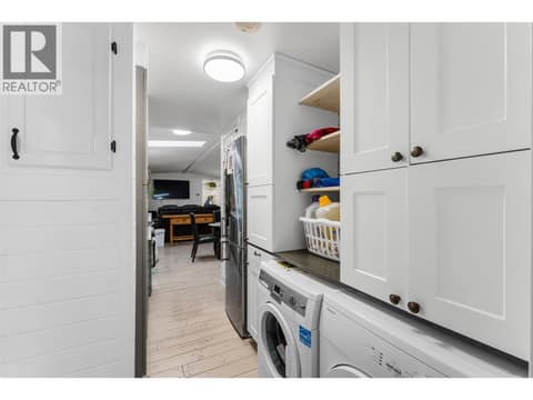 Laundry is tucked away. at 610 Katherine Road Unit# 12, West Kelowna Estates