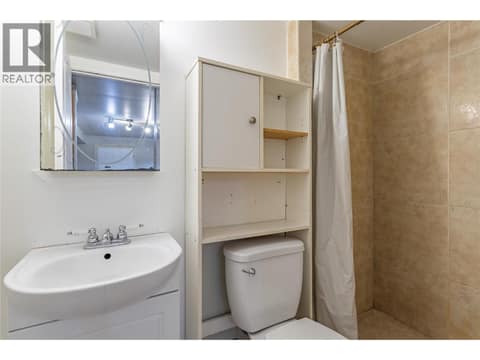 Full bathroom on the lower level at 240 Petch Road, Rutland South, Kelowna