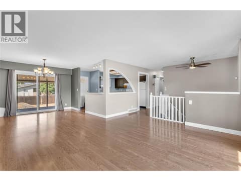 Main floor open concept living and dining room at 240 Petch Road, Rutland South, Kelowna