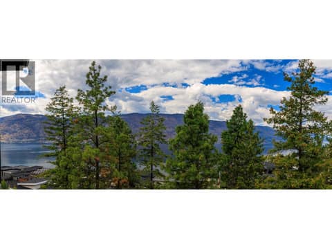 Panoramic views from the covered sundeck at 3303 Water Birch Circle, McKinley Landing, Kelowna