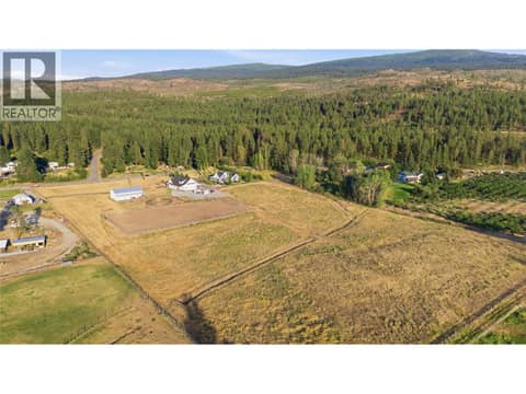 Hay Fields and Seasonal Creek at 4588 Sallows Road, South East Kelowna