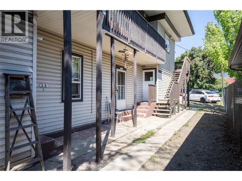 Access door at back goes down to the utility room and the common washer Dryer at 3601 31 Street, City of Vernon