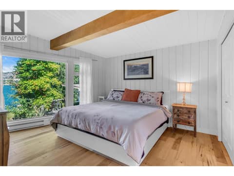 Bedroom with bright views at 12110 Trewhitt Road W, Lake Country East / Oyama