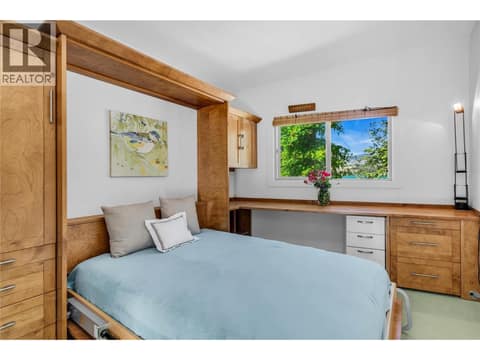 Guest room with murphy bed at 12110 Trewhitt Road W, Lake Country East / Oyama