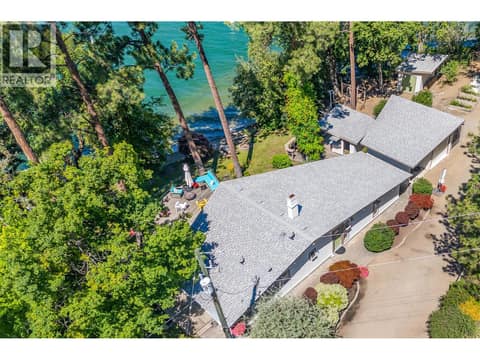 Home with lakefront and driveway at 12110 Trewhitt Road W, Lake Country East / Oyama