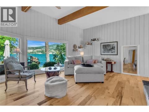 Living room with expansive views of the lake at 12110 Trewhitt Road W, Lake Country East / Oyama