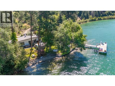 The home is right on the water at 12110 Trewhitt Road W, Lake Country East / Oyama