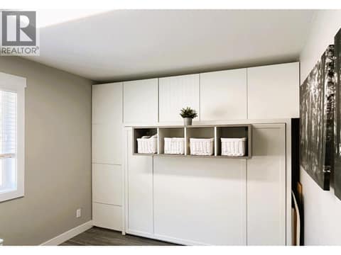Second Bedroom with pull out bed and storage at 3197 Shuswap Road, South Thompson Valley, Kamloops