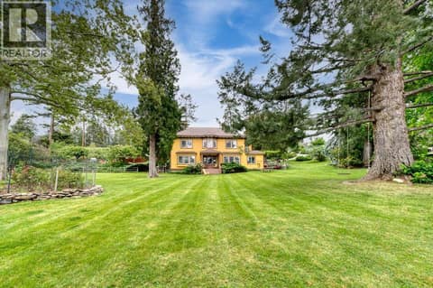 Main Farm House with 300+ year old Fir Tree at 4852-4858 Lakeshore Road, Upper Mission, Kelowna