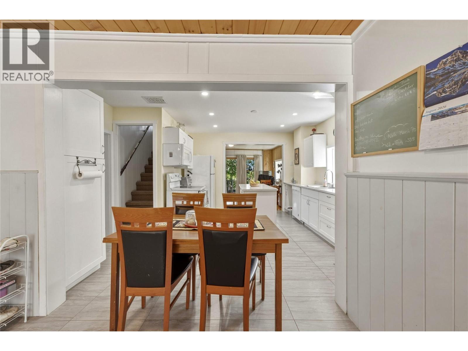 Dining area looking towards kitchen at 244 Mabel Lake Road, Lumby Valley