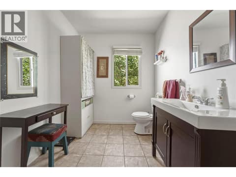 Half bath main level at 244 Mabel Lake Road, Lumby Valley