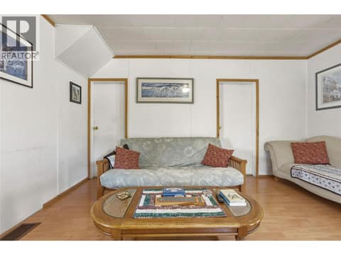 Living Room bedrooms on either side at 244 Mabel Lake Road, Lumby Valley