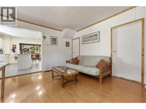 Living room looking towards kitchen at 244 Mabel Lake Road, Lumby Valley