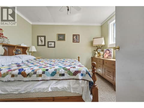 Main floor bedroom at 244 Mabel Lake Road, Lumby Valley