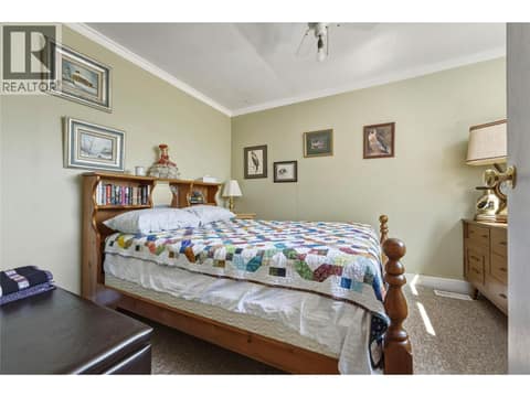 Main floor bedroom at 244 Mabel Lake Road, Lumby Valley