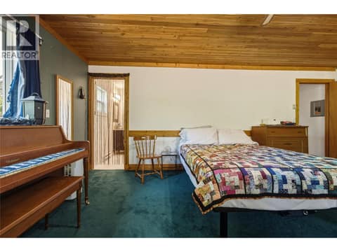 Primary bedroom at 244 Mabel Lake Road, Lumby Valley