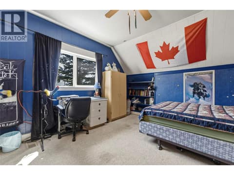 Spacious upper level bedroom at 244 Mabel Lake Road, Lumby Valley