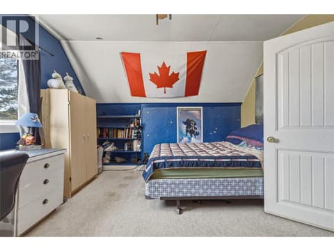 Upper level bedroom at 244 Mabel Lake Road, Lumby Valley