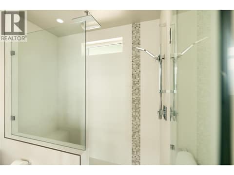 Walk in shower with rain head and slide bar at 3320 Acacia Lane, McKinley Landing, Kelowna
