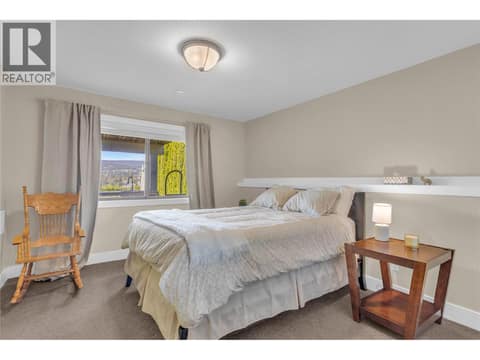 3rd spacious bedroom downstairs at 2493 Ironridge Road, Smith Creek, West Kelowna