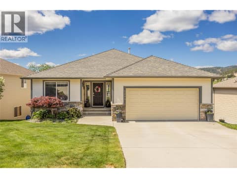 Beautifully maintained curb appeal at 2493 Ironridge Road, Smith Creek, West Kelowna
